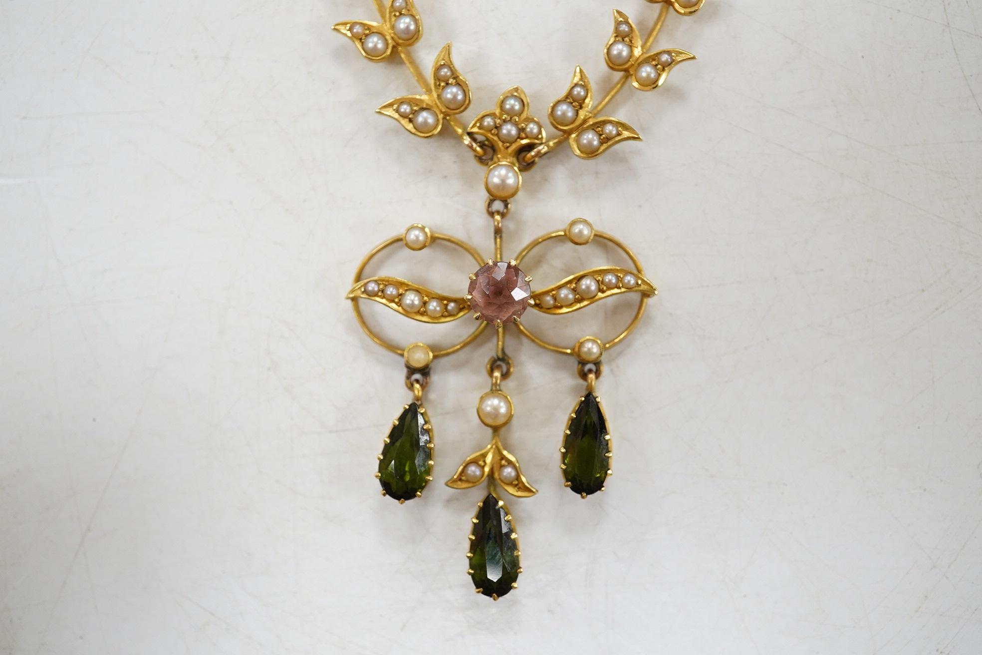 An early 20th century yellow metal and gem cluster set drop pendant necklace, 45cm, gross weight 12.7 grams. Condition - fair to good